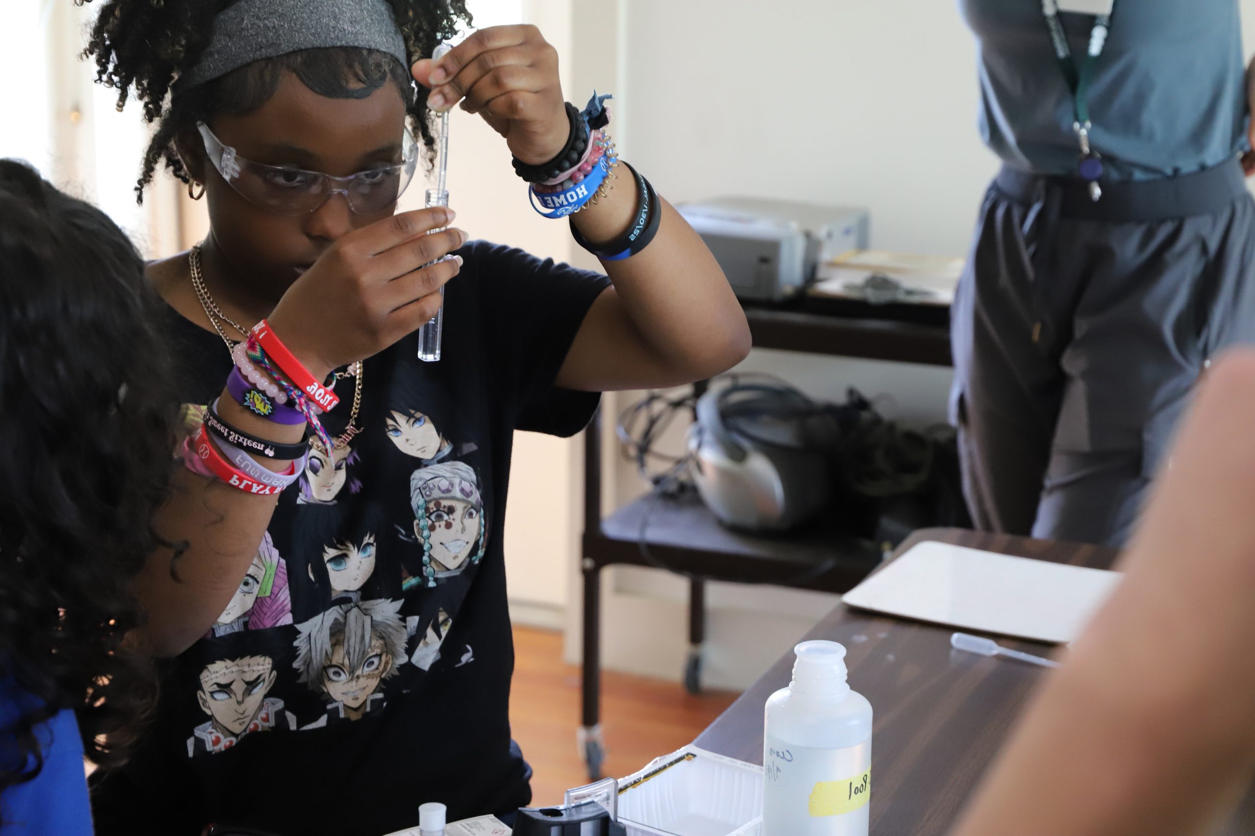 A middle school student conducts a science experiment