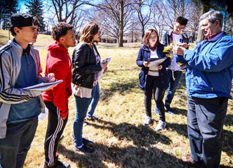 A group of teachers standing outside at oakwood friends school